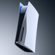 A PlayStation 5 floats in mid-air with a white-to-black gradient background.